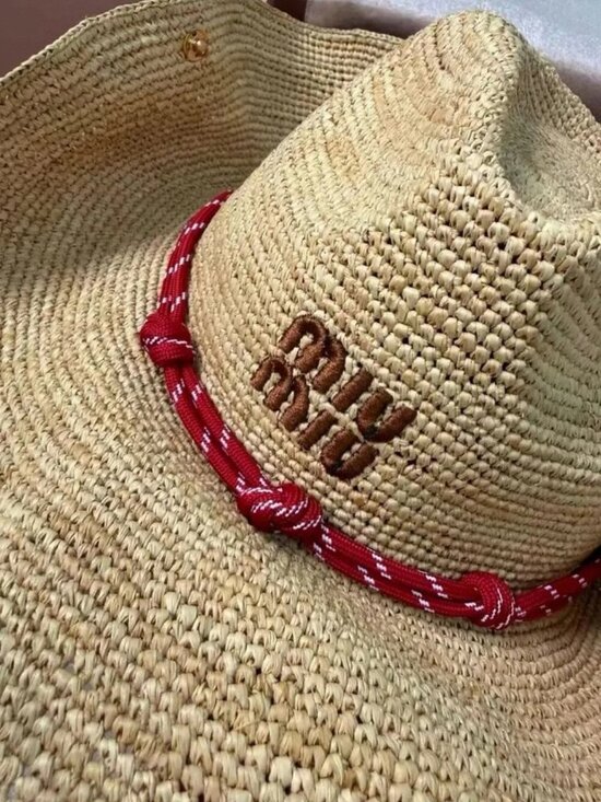 Miu Miu Women\'s Elegant Beige Straw Hat with Striking Red Bow